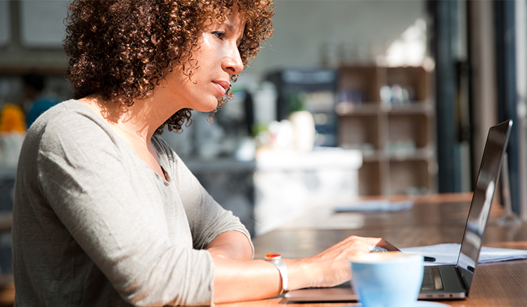 diverse woman at laptop