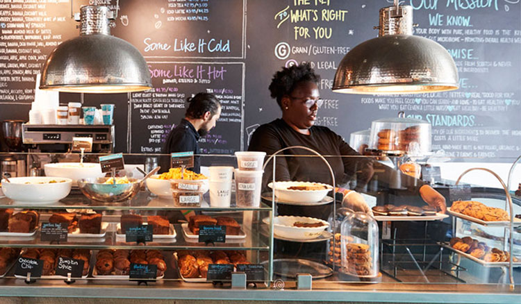 People working in a coffee shop