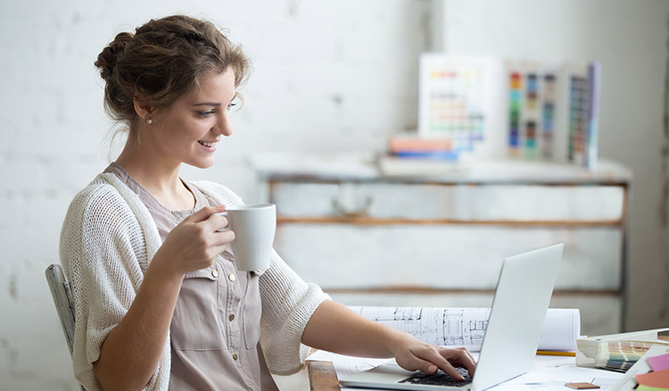 Caucasian Female Business Professional Using Laptop